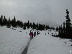 Walking in the snow to Peyto Lake at Bow Pass on the Icefields Parkway