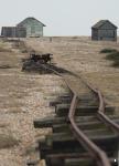 Track between the road and the seafront at Dungeness